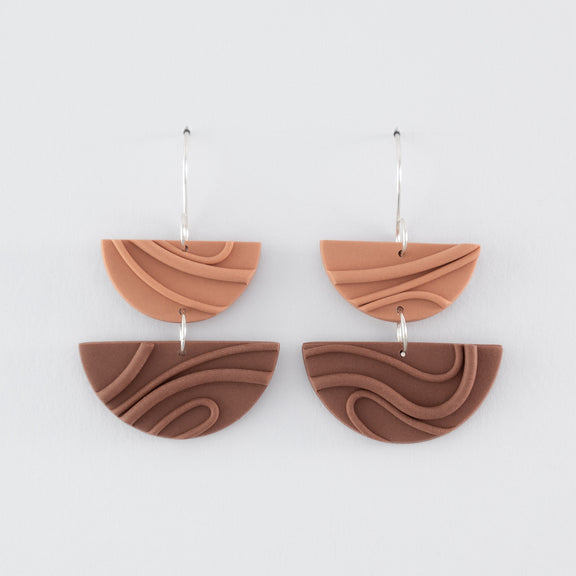Mocha Mousse handmade dangle earrings – creamy brown, double half-circle shapes, with playful wavy textures and 925 sterling silver findings on light grey background.